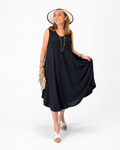 Robe noire fluide et élégante, à la coupe ample et confortable
